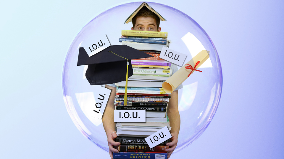 student carrying a lot of books